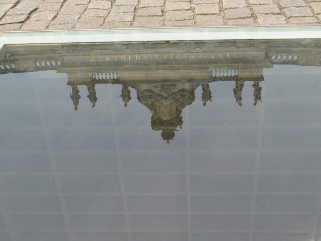 Image 2: Like Memorial, contemporary monuments often make use of conspicuous absences; here the subterranean set of empty shelves commemorating the Nazi book burning on Bebelplatz in Berlin. © Carolin Hahnemann